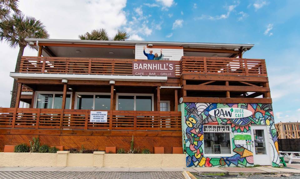 Owners Ted and Marge Barnhill in front of Barnhill's Café, Bar & Grill in Flagler Beach.