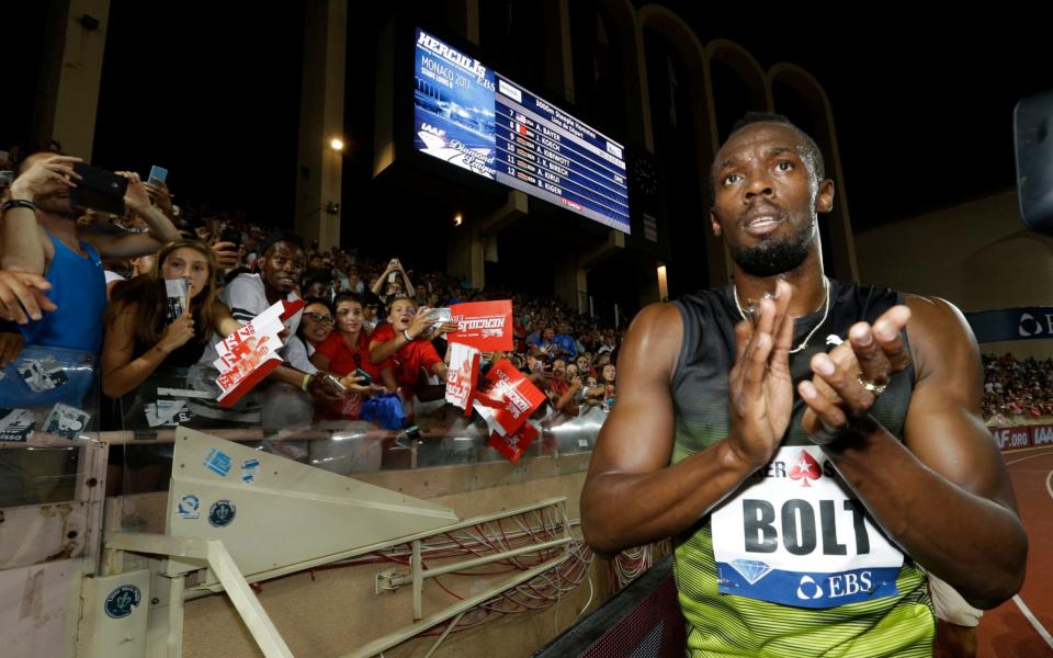 Jamaica's Usain Bolt acknowledges the crowd after winning the men's 100m race at the IAAF Diamond League Athletics meeting at the Louis II Stadium in Monaco - Credit:  AP