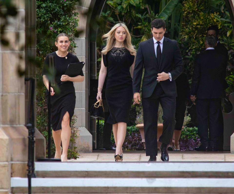 Tiffany Trump and her husband, Michael Boulos, arrive Thursday for the funeral of Amalija Knavs.