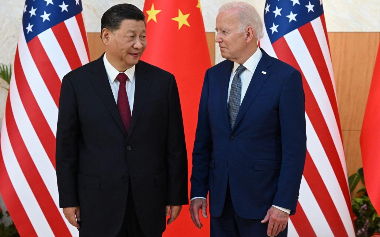 Xi Jinping and Joe Biden - SAUL LOEB/AFP