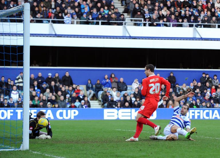 MK Dons' Ryan Harley scores against Queens Park Rangers during their 4-2 FA Cup fourth round win at Loftus Road in London on January 26, 2013
