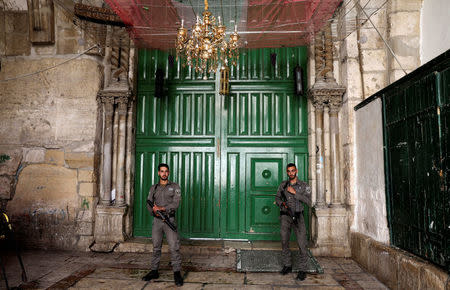 Israeli border policemen secure the entrance to the compound known to Muslims as Noble Sanctuary and to Jews as Temple Mount, in Jerusalem's Old City July 14, 2017. REUTERS/Ammar Awad