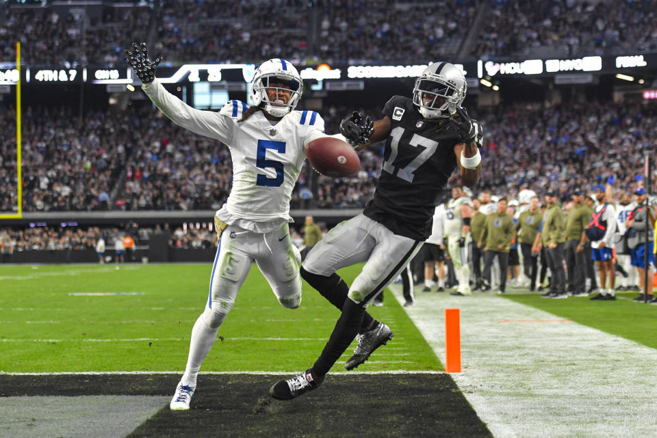 Indianapolis Colts cornerback Stephon Gilmore (5) breaks up a pass to Las Vegas Raiders wide receiver Davante Adams (17) in the final minute of the second half of an NFL football game in Las Vegas, Fla., Sunday, Nov. 13, 2022. The Colts defeated the Raider 25-20. (AP Photo/David Becker)