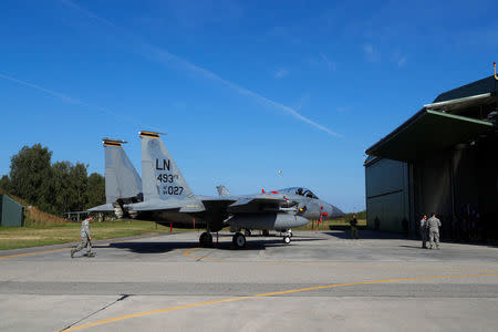 U.S. Air Force F-15C Eagle fighter is seen during NATO Baltic air policing mission takeover ceremony in Siauliai, Lithuania August 30, 2017. REUTERS/Ints Kalnins