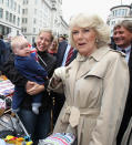 LONDON, ENGLAND - JUNE 03: Camilla, Duchess of Cornwall attends the 'Big Jubilee Lunch' in Piccadilly ahead of the Diamond Jubilee River Pageant on June 3, 2012 in London, England. For only the second time in its history the UK celebrates the Diamond Jubilee of a monarch. Her Majesty Queen Elizabeth II celebrates the 60th anniversary of her ascension to the throne. Thousands of well-wishers from around the world have flocked to London to witness the spectacle of the weekend's celebrations. The Queen along with all members of the royal family will participate in a River Pageant with a flotilla of a 1,000 boats accompanying them down The Thames. (Photo by Chris Jackson - WPA Pool /Getty Images)