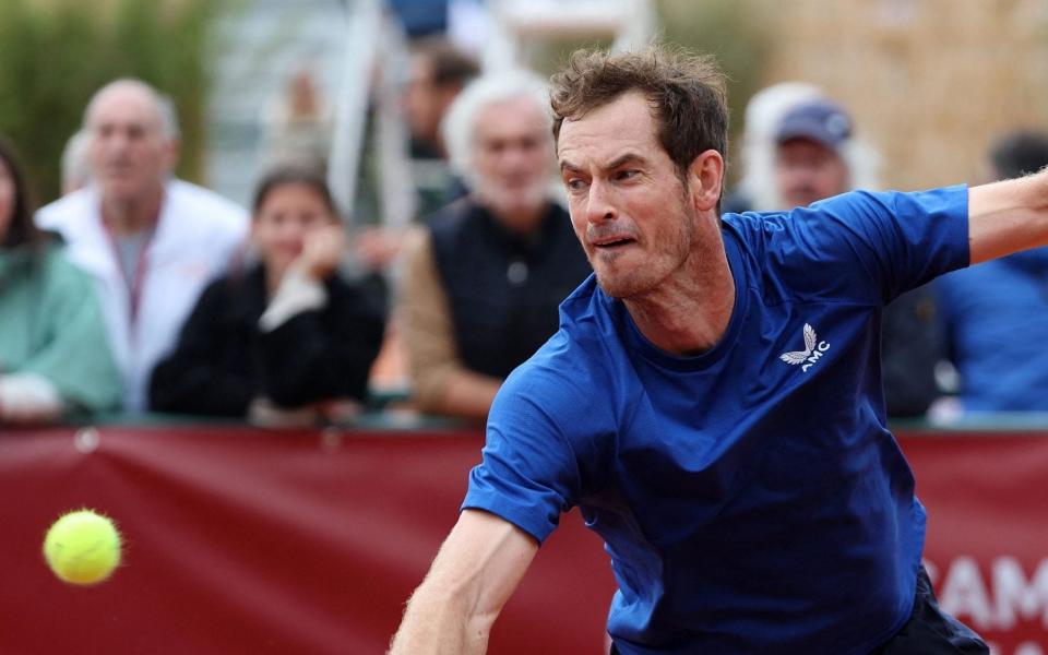 Andy Murray playing a backhand in Bordeaux - Don’t be fooled by Andy Murray’s 'fatigue' – he thinks he can win Wimbledon - AFP/ROMAIN PERROCHEAU