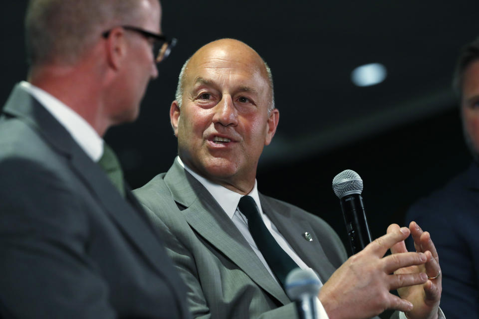 Colorado State head coach Steve Addazio, back, chats with athletic director Joe Parker during an announcement that Addazio has been hired as the new head football coach at a news conference at the school Thursday, Dec. 12, 2019, in Fort Collins, Colo. (AP Photo/David Zalubowski)