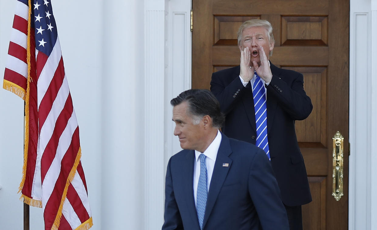 President-elect Donald Trump calls out to the media as Mitt Romney leaves the Trump National Golf Club Bedminster in Bedminster, N.J., on Nov. 19, 2016. (Photo: Carolyn Kaster/AP)