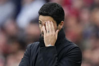 Arsenal's manager Mikel Arteta reacts during the English Premier League soccer match between Arsenal and Aston Villa at the Emirates stadium in London, Sunday, April 14, 2024. (AP Photo/Kirsty Wigglesworth)