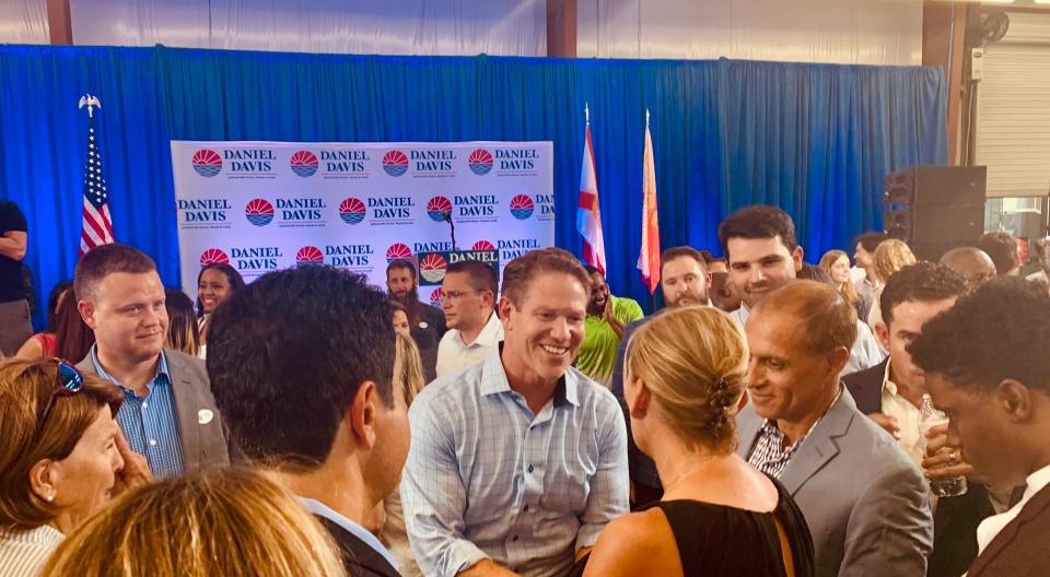 Daniel Davis, Republican candidate for Jacksonville mayor, greets supporters after he launched his campaign on Sept. 8, 2022 at Tom Nehl Trucking Company.