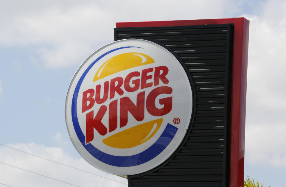 The sign on a Burger King restaurant is shown in Miami, Florida October 28, 2013. Picture taken October 28, 2013.  REUTERS/Joe Skipper (UNITED STATES - Tags: BUSINESS LOGO)