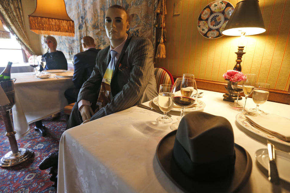 Mannequins provide social distancing at the Inn at Little Washington as they prepare to reopen their restaurant Thursday May 14, 2020, in Washington, Va. The manager say that every other table will have mannequins for social distance guidance when, according to state guidelines, the 5-star restaurant will be allowed reopen on May 29th. (AP Photo/Steve Helber)