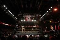 WWE wrestler Bin Wang of China is deadlocked by opponent Wesley Blake during a taping of the WWE's NXT show at Full Sail University in Winter Park, Florida, November 30, 2016. REUTERS/Scott Audette