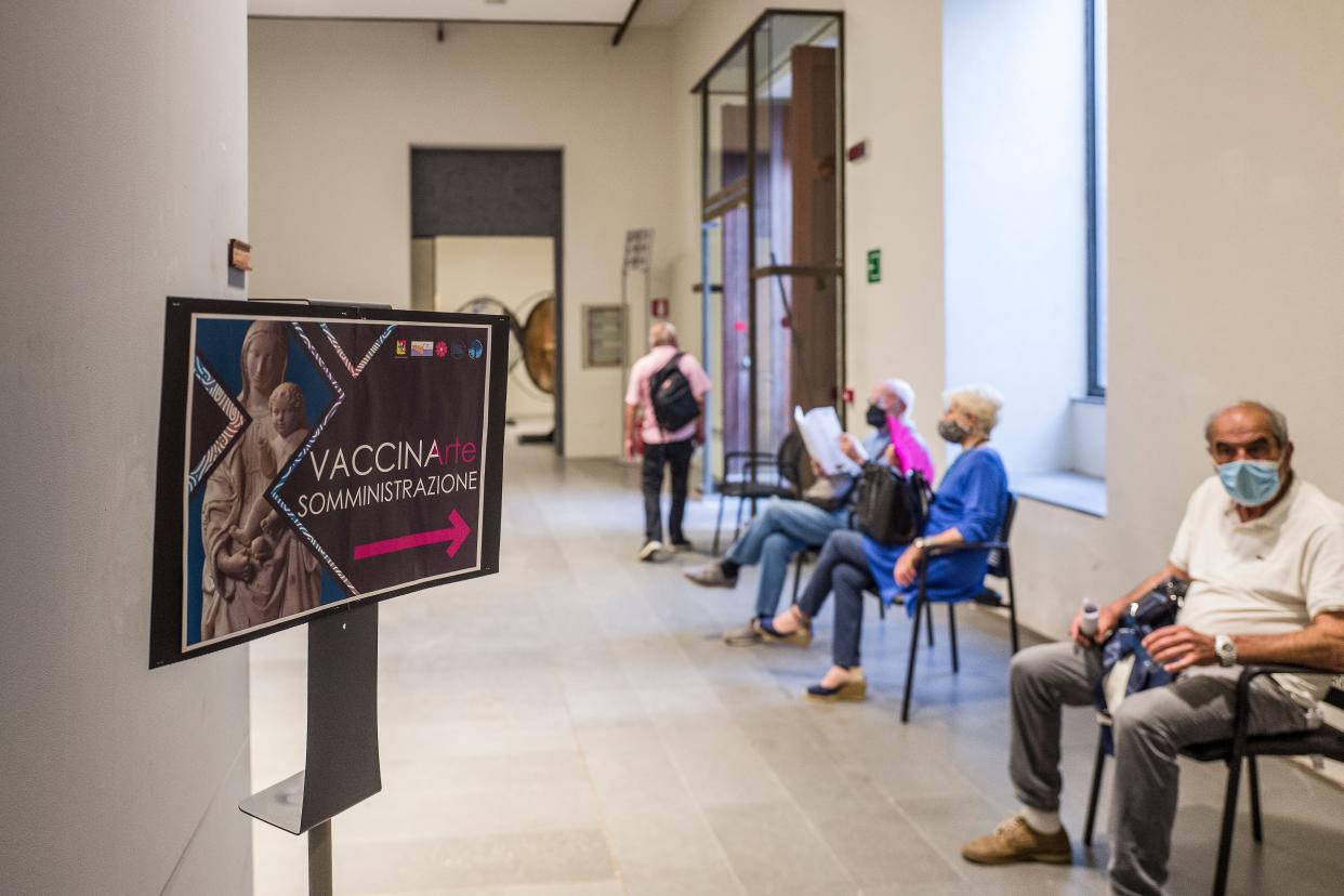 People waiting in line in the vaccination room at the MuMe-Museo Regionale di Messina on June 10, 2021. Three museums in Sicily will be installing vaccination hubs for just one evening.