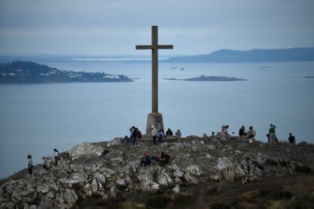 A huge cross is seen overlooking the Eastern Irish coastline of Counties Wicklow and Dublin in Bray, Ireland, August 16, 2018. Picture taken August 19, 2018. Picture taken August 19, 2018. REUTERS/Clodagh Kilcoyne