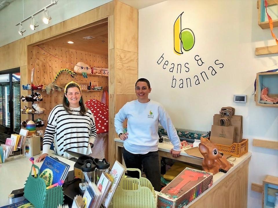 Owner Emily Pote (left) and manager Zita Webb welcome shoppers to Belhaven Town Center’s newest retail store, Beans and Bananas.