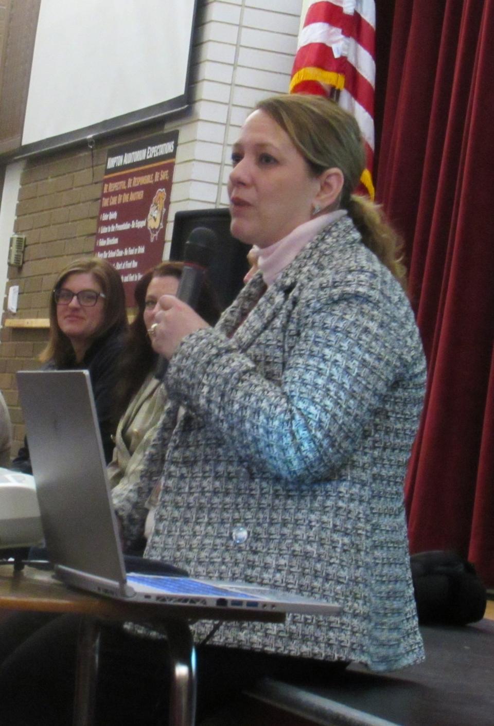 Kristen Prough, interim superintendent, talks to those who attended Thursday's school facilities forum. More than 90 people came to Kimpton Middle School to learn more about the facilities proposals and give feedback on the direction the school district should take.