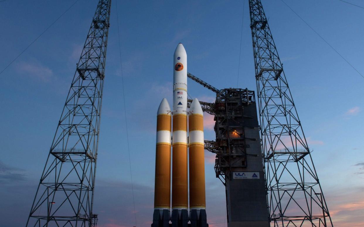 This handout photo released by NASA shows the United Launch Alliance Delta IV Heavy rocket with the Parker Solar Probe onboard shortly after the Mobile Service Tower was rolled back on August 10, 2018, Launch Complex 37 at Cape Canaveral Air Force Station in Florida - AFP