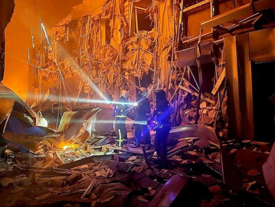 First responders work at the site of a missile strike, amid Russia's invasion of Ukraine, in Odesa, Ukraine in this handout image released May 10, 2022 (Reuters)