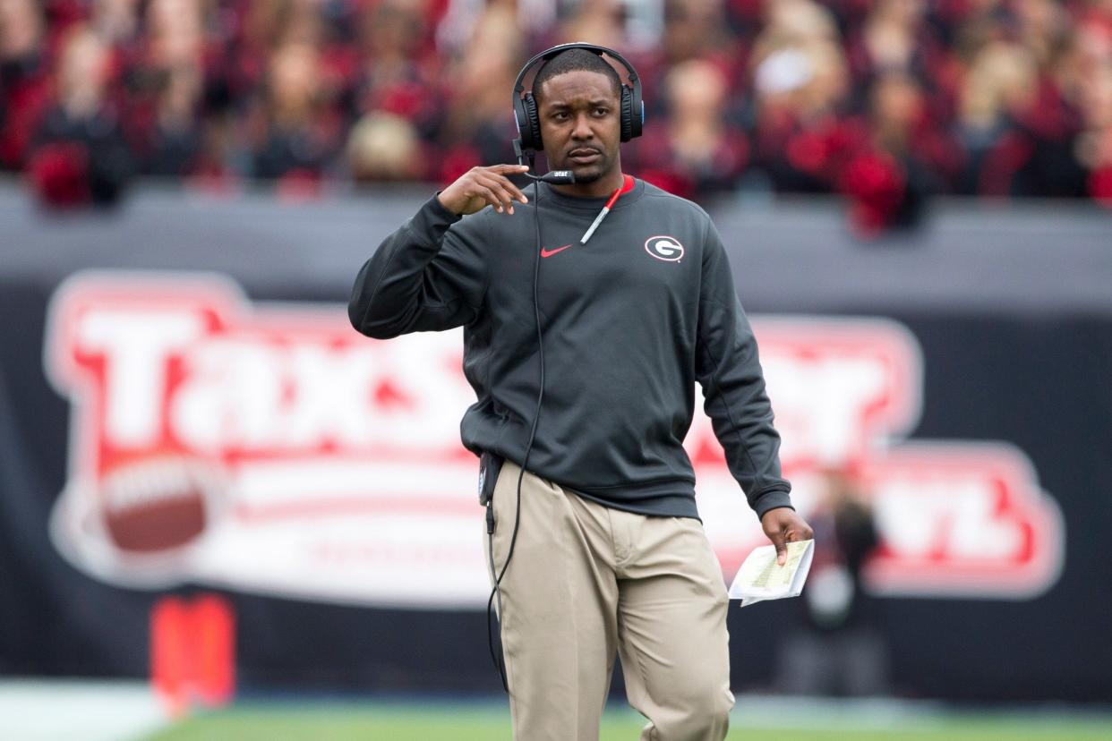 The Oregon Ducks have named pass game coordinator and wide receivers coach Bryan McClendon as the interim head football coach for the Alamo Bowl. MCClendon is seen here in 2016 while he was Georgia Bulldogs interim head coach.