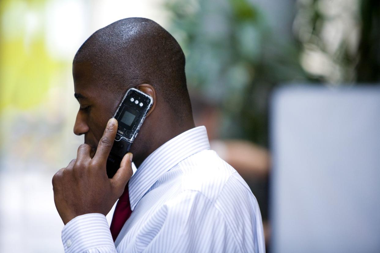 White collar worker on cellphone.