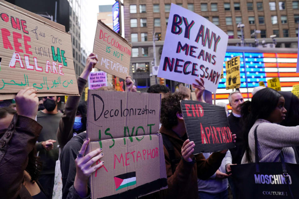 Photograph of people protesting in Times Square after Hamas launched an attack on Israel