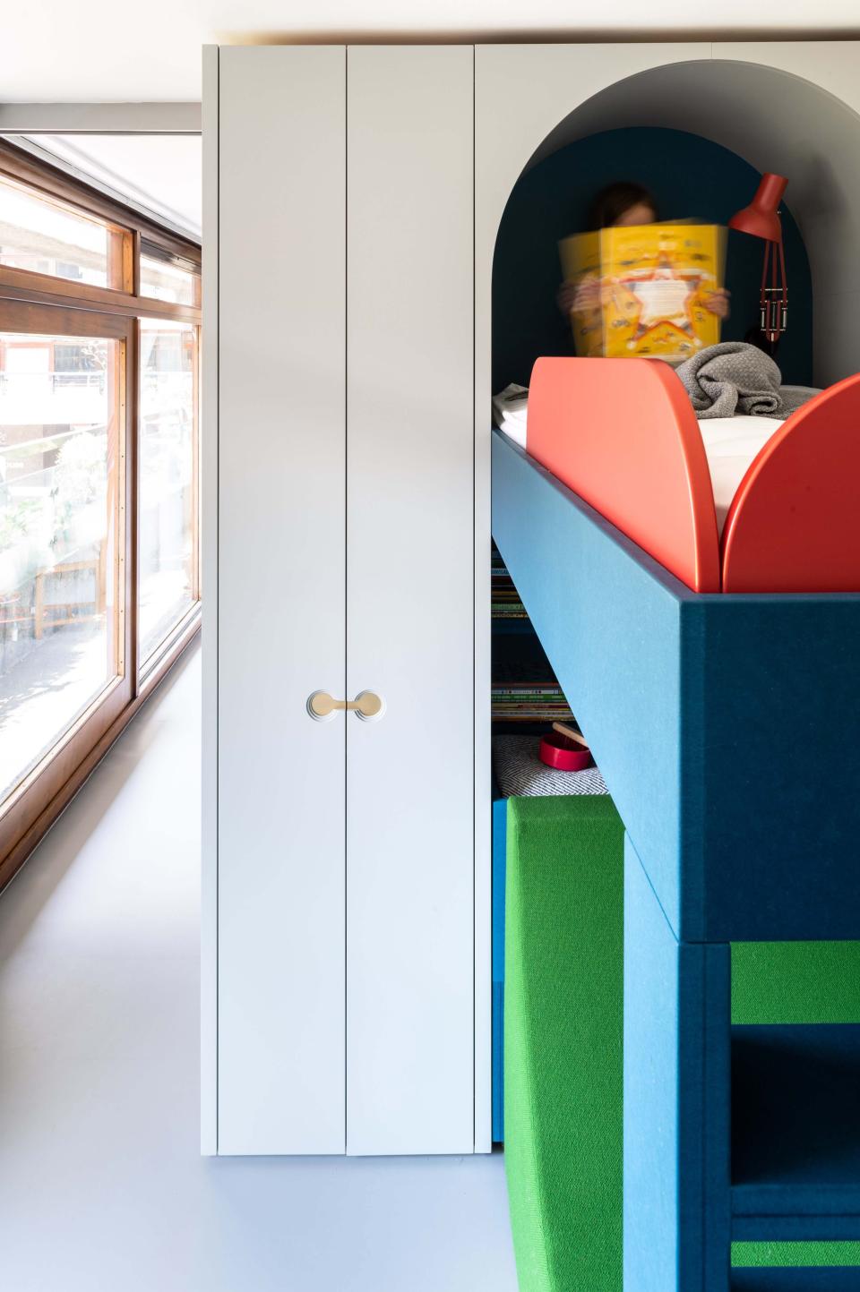 The custom cabinetry features handles that were routed out and inspired by the shapes of seating in the sunken gardens found throughout the Barbican. The design team, who also included Marco Nicastro and Massine Yalaoui, worked with Top Notch Joinery to fabricate the dream unit.