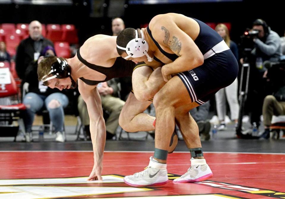 Penn State’s Aaron Brooks wrestles Iowa’s Zach Glazier in the 197 lb championship bout of the Big Ten Wrestling tournament at the Xfinity Center at the University of Maryland on Sunday, March 10, 2024. Abby Drey/adrey@centredaily.com