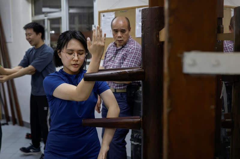 The Wider Image: Fifty years on, Bruce Lee's legacy squares up to modern life in Hong Kong