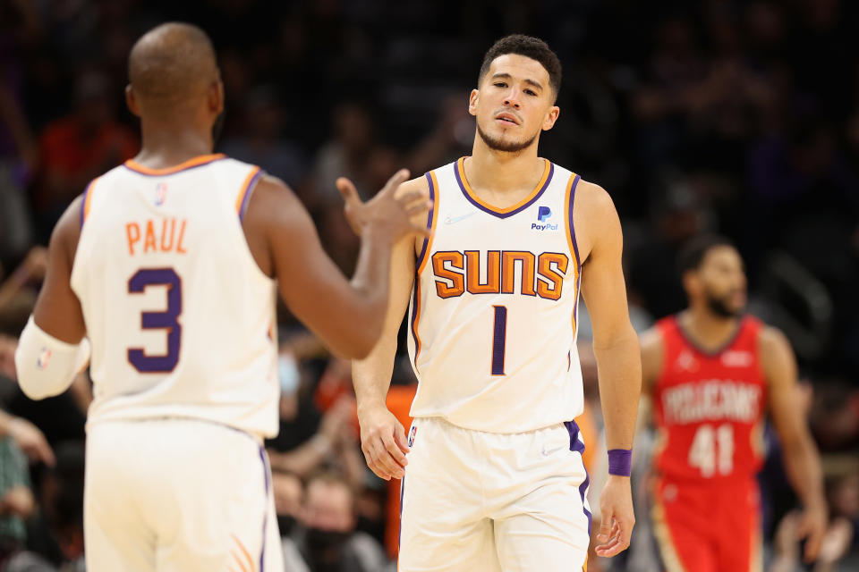 Phoenix Suns stars Chris Paul and Devin Booker hope to leave the New Orleans Pelicans in their NBA playoff wake. (Christian Petersen/Getty Images)