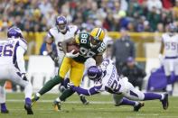 GREEN BAY, WI - DECEMBER 2: Jermichael Finley #88 of the Green Bay Packers catches a pass for a first down against A.J. Jefferson #24 of the Minnesota Vikings during the game at Lambeau Field on December 2, 2012 in Green Bay, Wisconsin. The Packers won 23-14. (Photo by Joe Robbins/Getty Images)