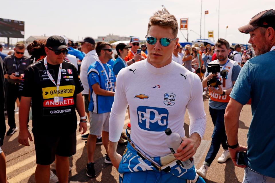 Josef Newgarden walks through the paddock during qualifying for the Firestone Grand Prix of St. Petersburg on March 9, 2024.