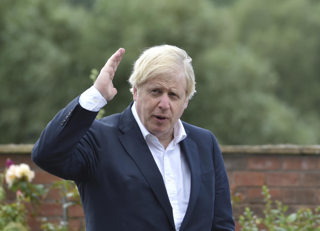 NOTTINGHAM, ENGLAND - JULY 28: British Prime Minister Boris Johnson speaks to local people at the Canal Side Heritage Centre in Beeston on July 28, 2020 in Beeston near Nottingham, England. The government is launching a new cycling intuitive to help get people fitter. (Photo by Rui Vieira - WPA Pool/Getty Images)