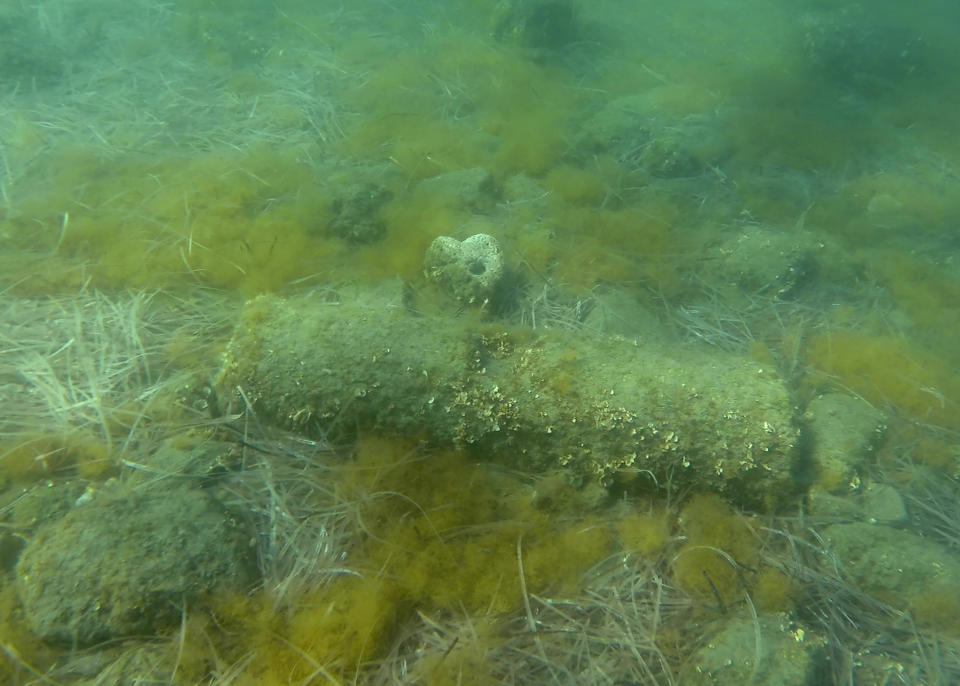 A submerged stone remain of the ancient harbor next of Amathus ancient city, in the eastern Mediterranean island of Cyprus, on Thursday, July 1, 2021. Lying just a few feet underwater a mere 200 feet off the coastline near the resort town of Limassol, this 2,400 year-old harbor said to be built Alexander the Great's successors will soon be Cyprus' newest tourist attraction where adventurous holidaymakers could snorkel over its submerged stone remains. (AP Photo/Petros Karadjias)