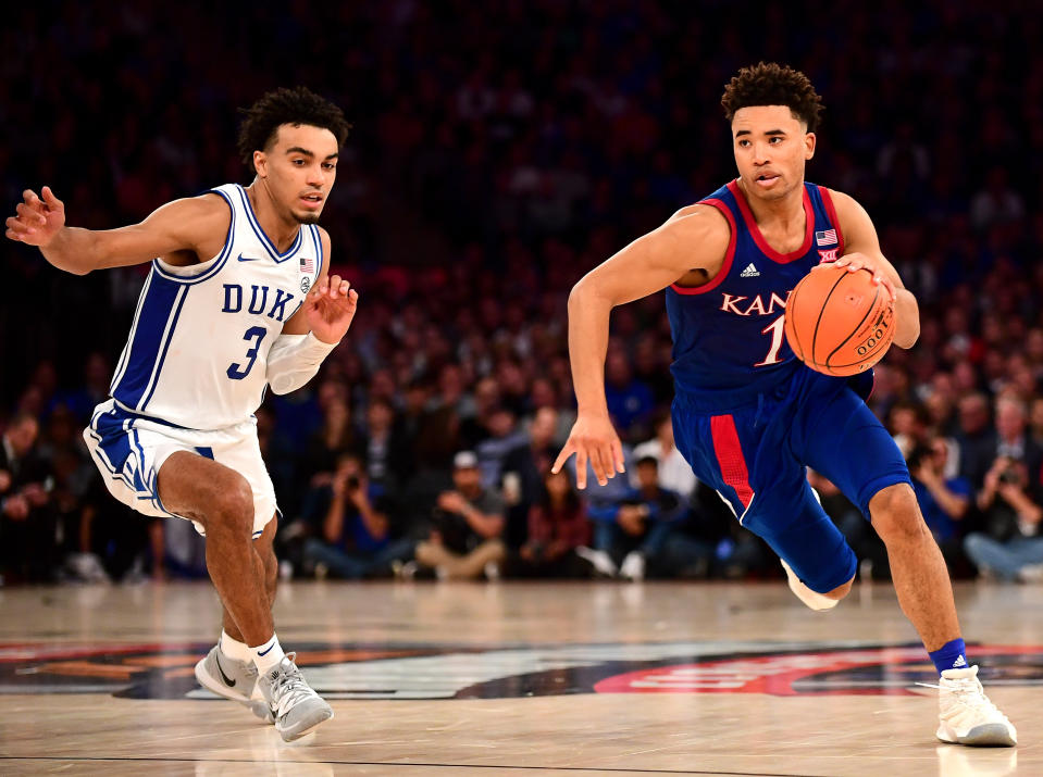 Devon Dotson #1 of the Kansas Jayhawks dribbles the ball down court while being guarded by Tre Jones #3 of the Duke Blue Devils during their game on Nov. 05, 2019 in New York City. (Emilee Chinn/Getty Images)