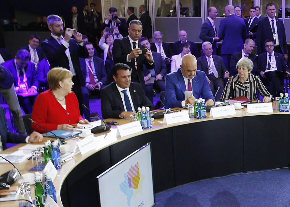 Germany Federal Chancellor Angela Merkel,left, Edi Rama ,second left, Prime Minister of Albania,Zoran Zaev Prime Minister of Northern Macedonia, and British Prime Minister Theresa May meet before the start of the plenary session at the Western Balkans Summit meeting that aims to reassure Western Balkan states that their aspirations to join the European Union have backing among EU leaders, in Poznan, Poland, Friday, July 5, 2019.(AP Photo/Czarek Sokolowski)