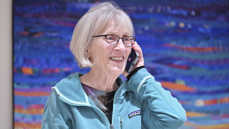 Claudia Goldin speaks to a reporter on the phone at her home in Cambridge, Mass., after learning that she received the Nobel Prize in economics on Monday, Oct. 9, 2023. Goldin, a professor at Harvard University, was honored for advancing understanding of women’s labor market outcomes.