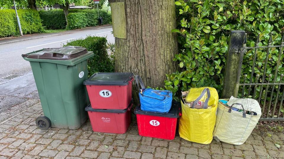 Boxes, bags and a bin for recycling