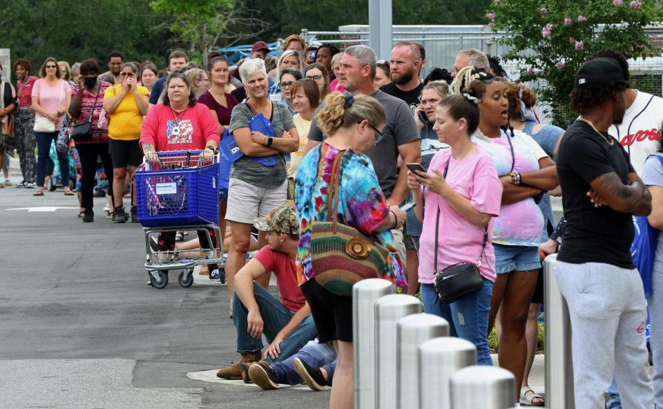 Over 100 people stood in line to be the first customers inside the new Goodwill store on East Dixon Boulevard Friday morning, August 26, 2022.