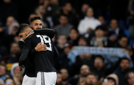 Soccer Football - International Friendly - Italy vs Argentina - Etihad Stadium, Manchester, Britain - March 23, 2018 Argentina’s Manuel Lanzini celebrates scoring their second goal with Ever Banega REUTERS/Phil Noble