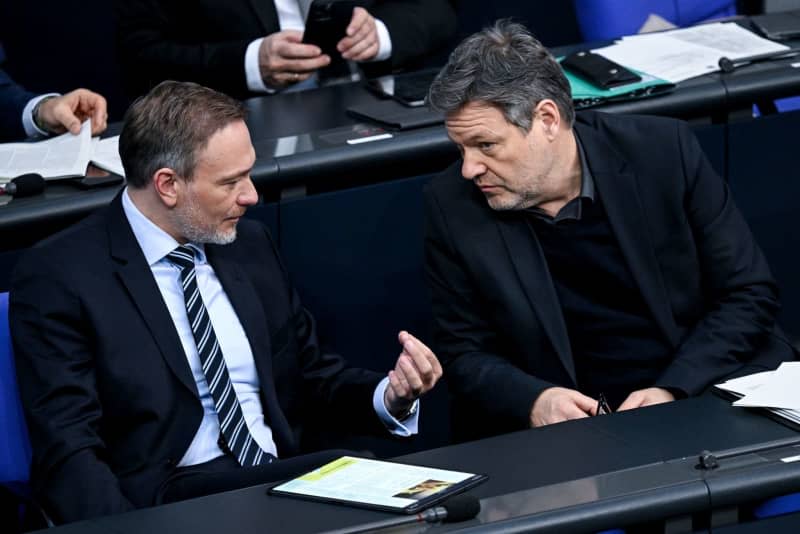 German Minister of Finance Christian Lindner, and Vice-Chancellor and Minister for Economic Affairs and Climate Protection Robert Habeck attend a plenary session to discuss the second Budget Financing Act 2024 at the German Bundestag. Britta Pedersen/dpa