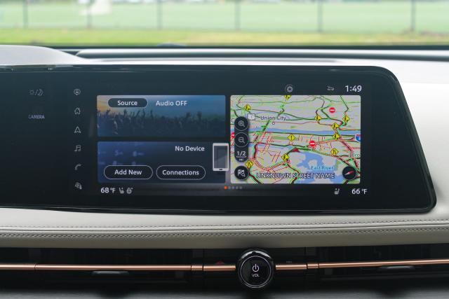 The infotainment screen of the 2023 Nissan Ariya SUV displays a map.