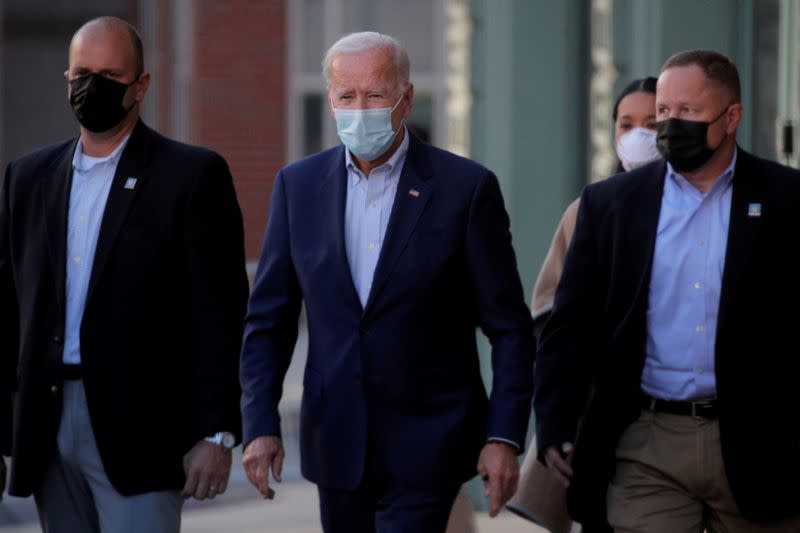 FILE PHOTO: U.S. Democratic presidential candidate and former Vice President Joe Biden exits The Queen theater after a virtual event in Wilmington