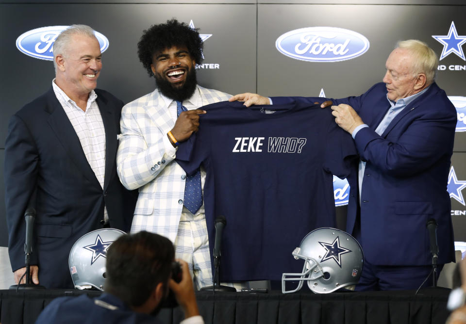 Ezekiel Elliott's contract situation became headline news, in part because Jerry Jones, right, knows how to dominate a news cycle. (AP)