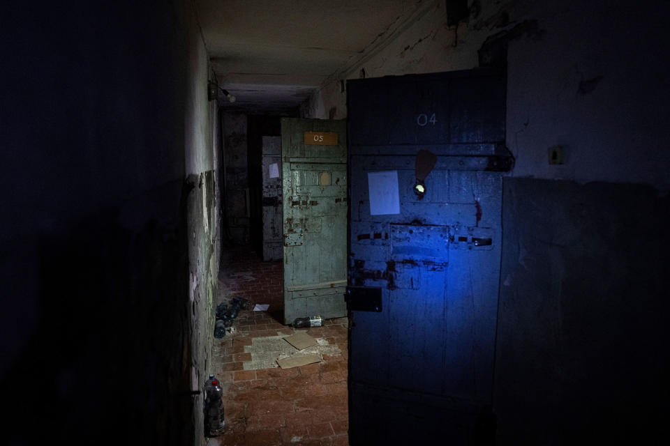 Holding cells are visible in a basement of a police station that was used by Russian forces to detain and torture Ukrainians in the recently liberated town of Izium, Ukraine, on Sept. 22, 2022.<span class="copyright">Evgeniy Maloletka—AP</span>