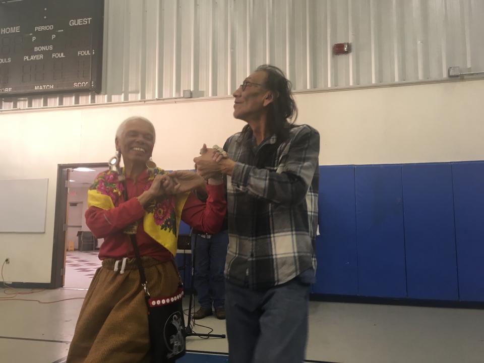 Nathan Phillips dancing with Carolyn Christmas during a break from the Standing Rock prayer walk in February 2018.