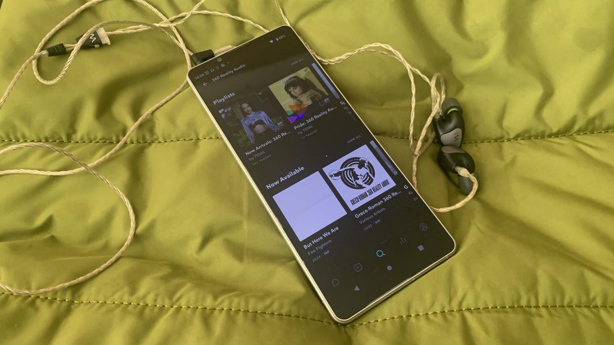  Sony XPeria 1 V streaming Tidal 360 Reality Audio tracks, on green background 