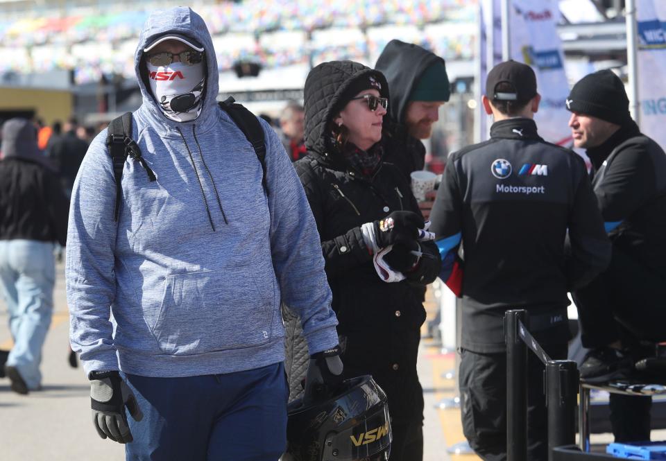 Race fans brave the cold and a strong wind as they check out the garage area, Sunday, January 21, 2024 on the final day of the Roar Before the 24 at Daytona International Speedway.