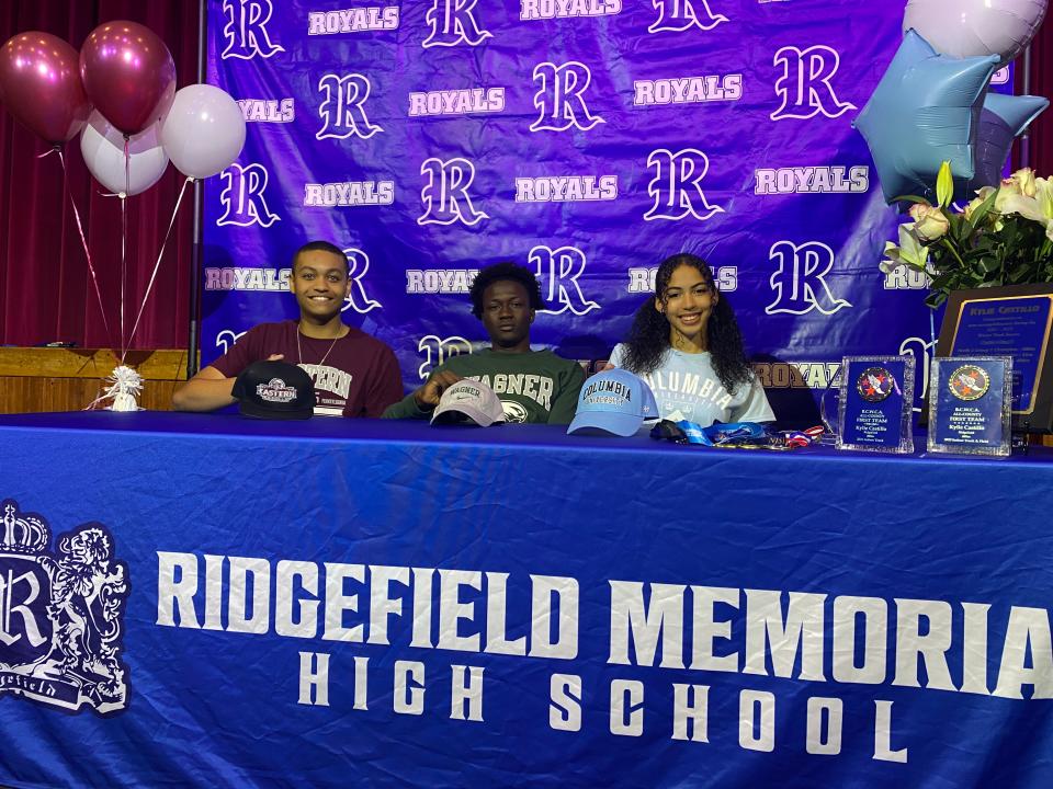 Three Ridgefield athletes signed letters of intent Friday for college athletics. From left, Joshua Espinal (baseball) Eastern U; Lasana Darboe (track) Wagner; Kylie Castillo (track) Columbia.