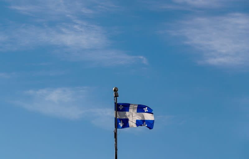 FILE PHOTO: A flag of Quebec flies near the Regional Parliament building ahead of the G7 Summit in Quebec